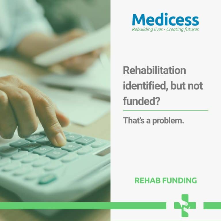 Person using a calculator while reviewing documents, illustrating rehabilitation funding decisions.